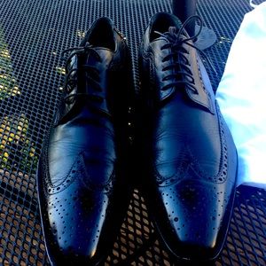 Dolce Gabana. Black wing tip.